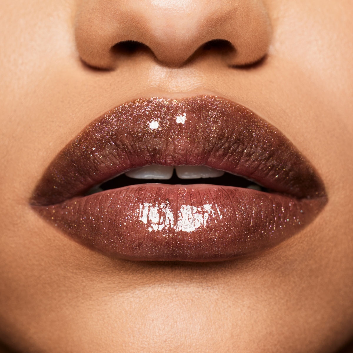 GLOSS BOMB STIX SHIMMER (LABIAL CON ACABADO BRILLOSO)